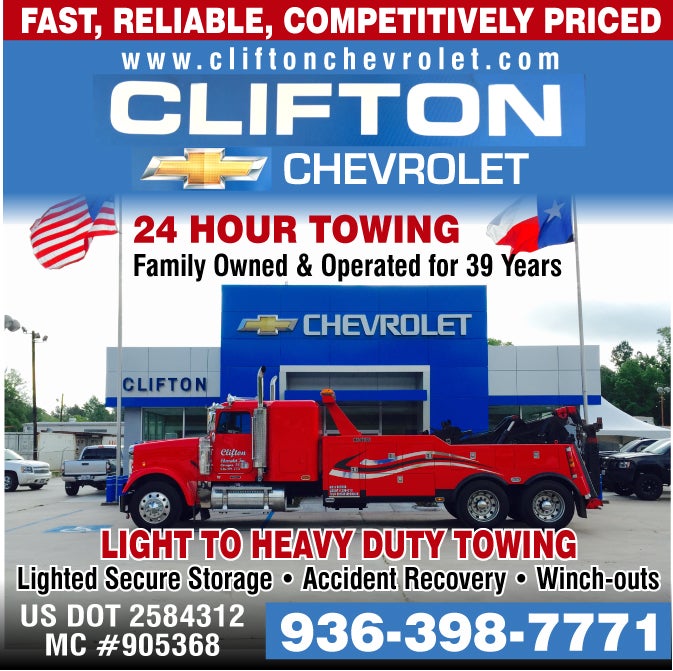 A person drinking coffee while researching cars